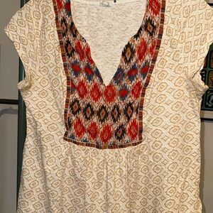Anthropologie Patterned T with contrast patterns, detailed back
